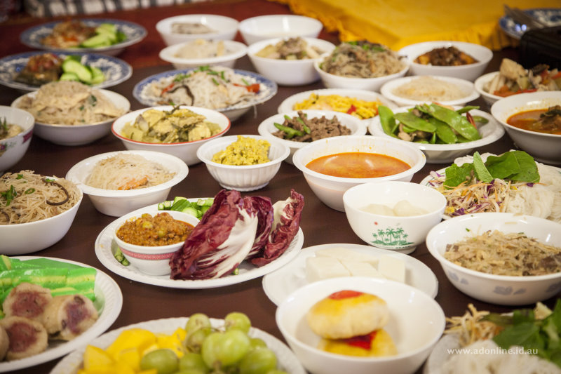 Bowls of food laid out on an altar