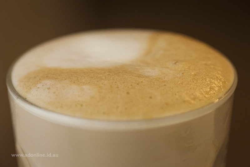 Froth atop a latte. 