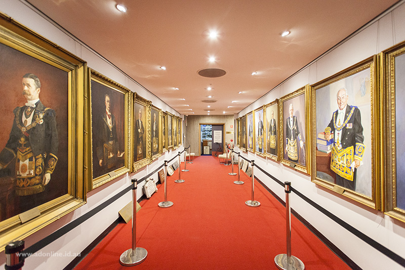 Corridor with portrait paintings down both sides