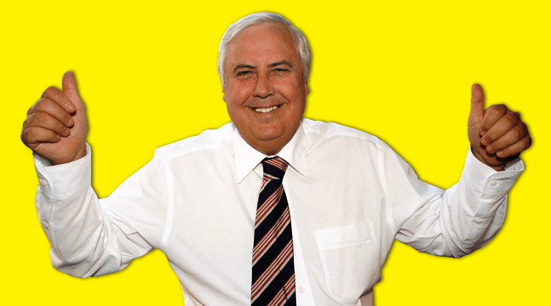 Portrait of Clive Palmer making thumbs-up gesture on yellow background