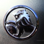 A Holden badge on the front of a car.